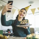 beautiful-young-woman-having-video-call-while-she-royalty-free-image-DJORDJEDJURDJEVIC / GETTY IMAGES